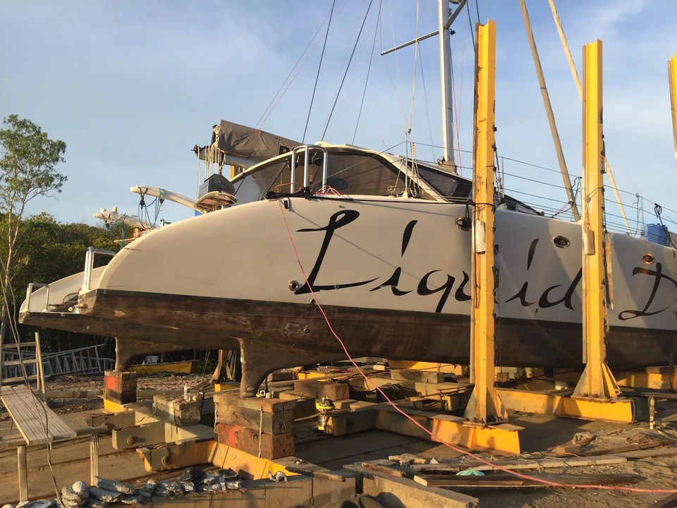 The yacht supported for work on its hull