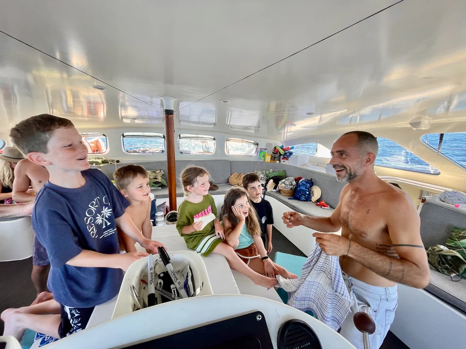 Guests and crew together in the saloon