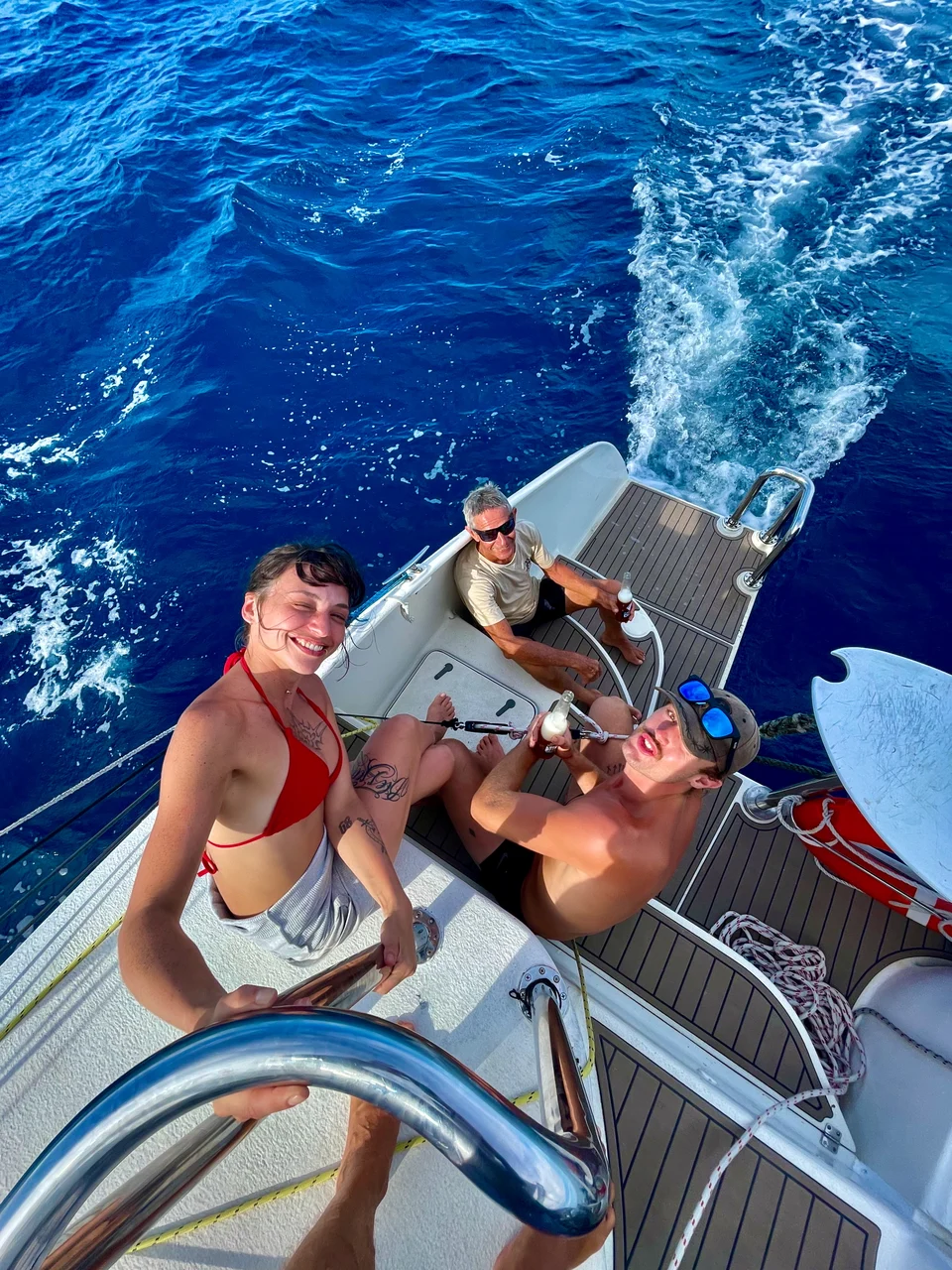 Guests relaxing on the aft deck while under way