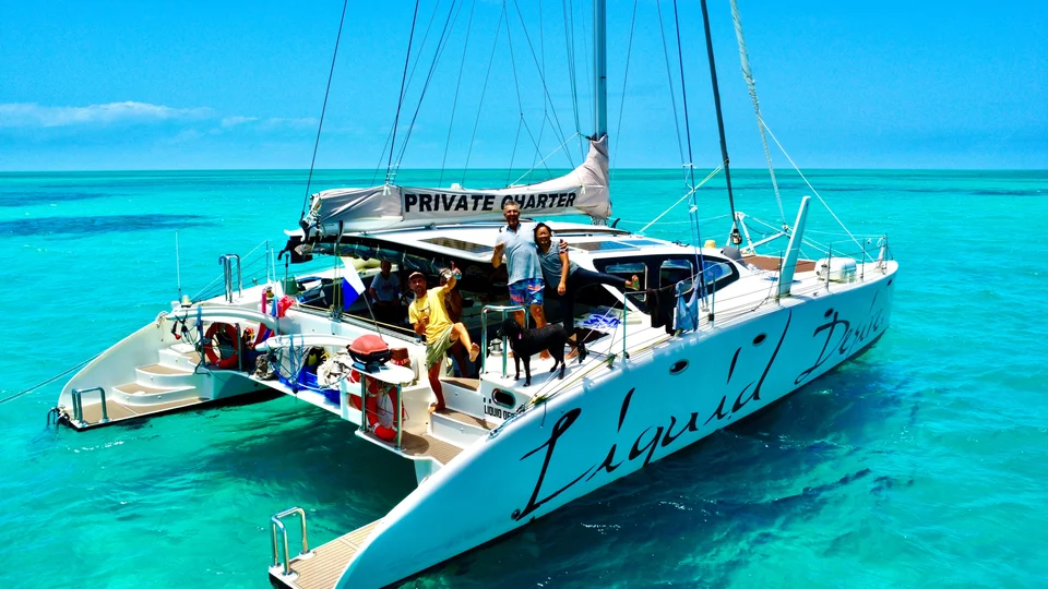 Guests aboard Liquid Desire at anchor