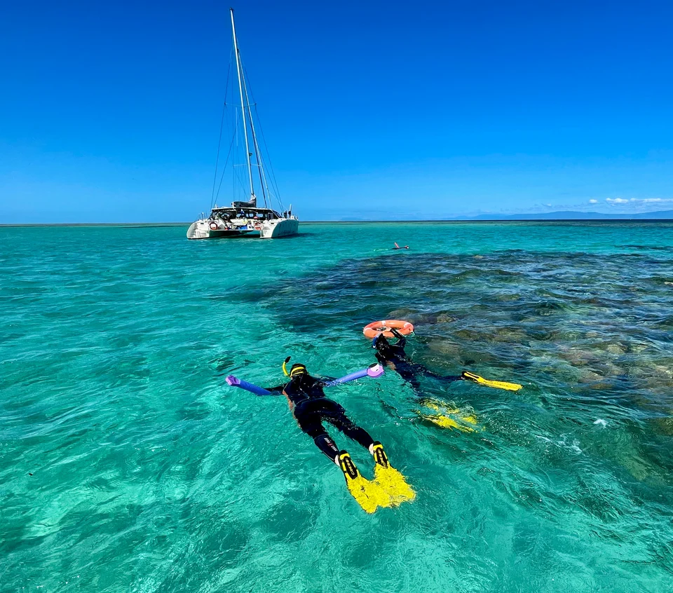 Snorkelling beside the reef