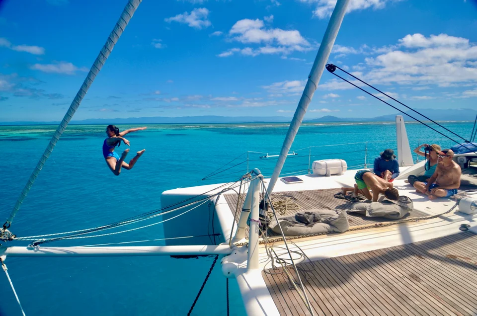Sailing and relaxing on the foredeck