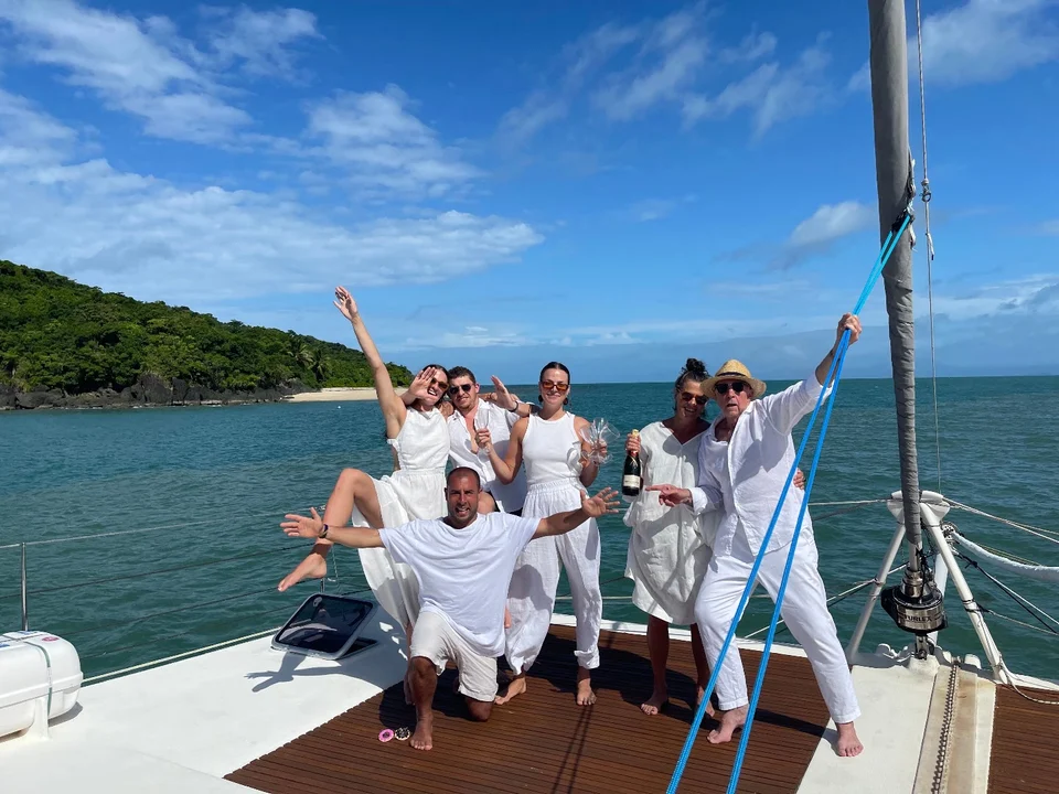 A group gathered on the foredeck