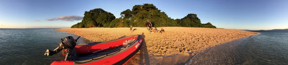 A dinghy pulled onto the beach