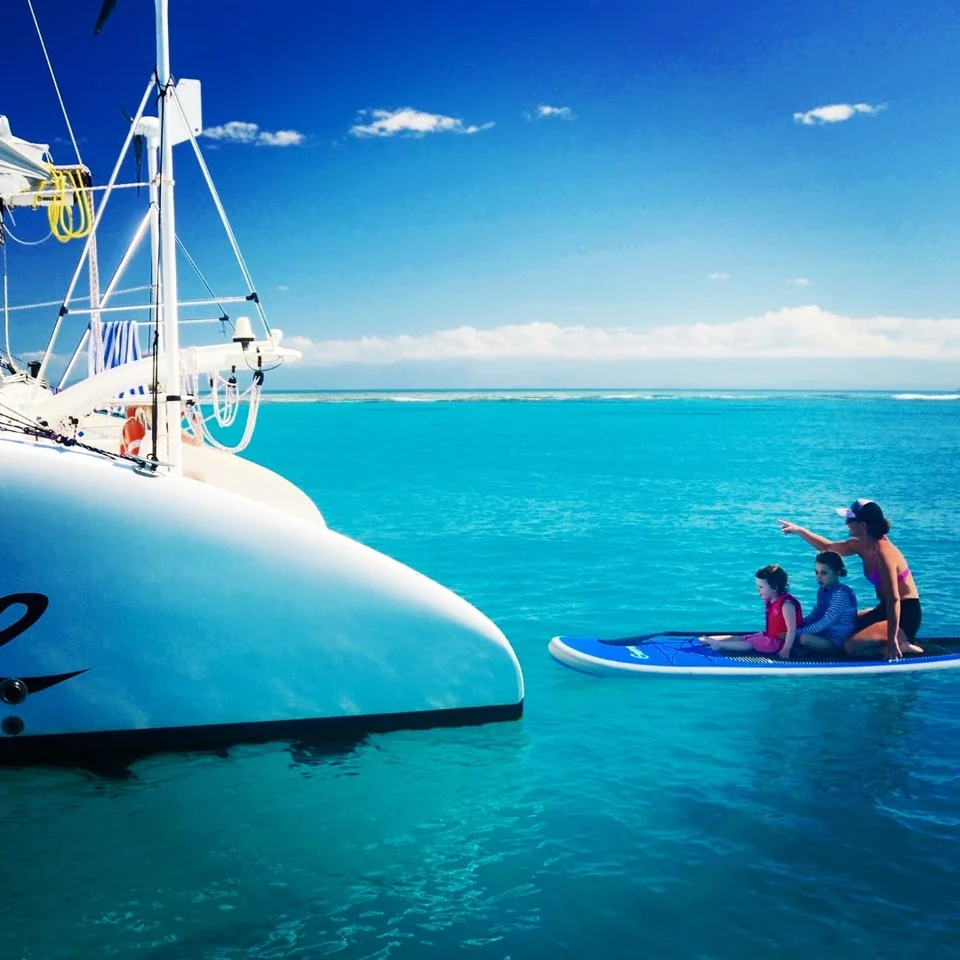 Paddleboarding alongside the bow