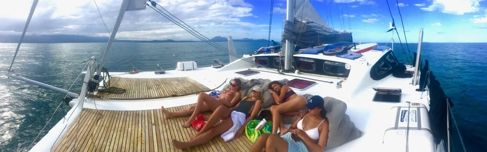 Relaxing on the foredeck under sail
