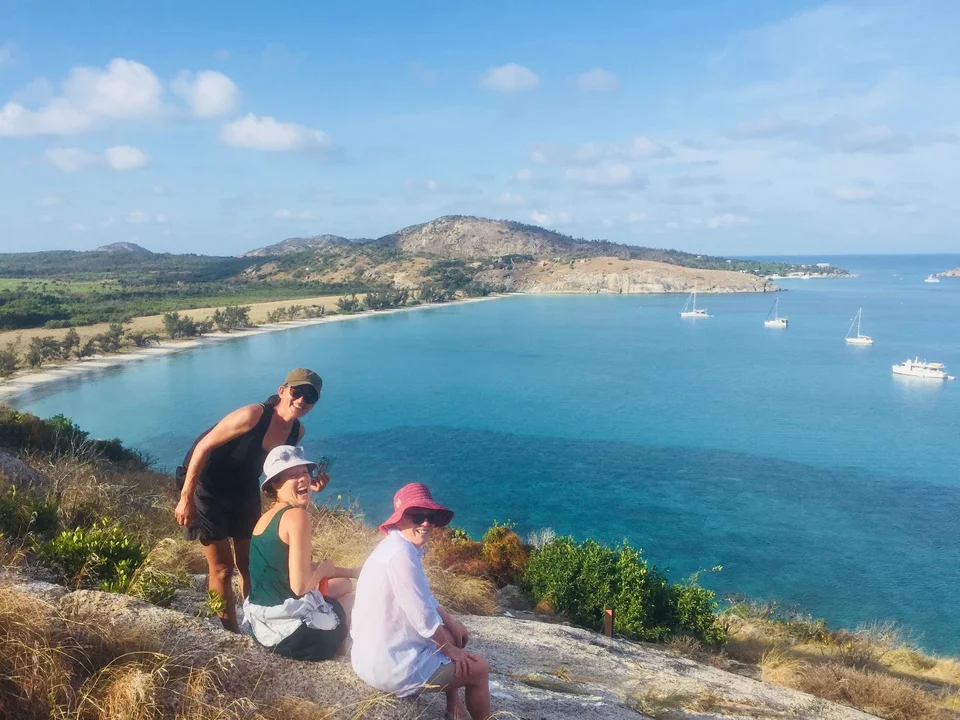 Guests above a sheltered bay