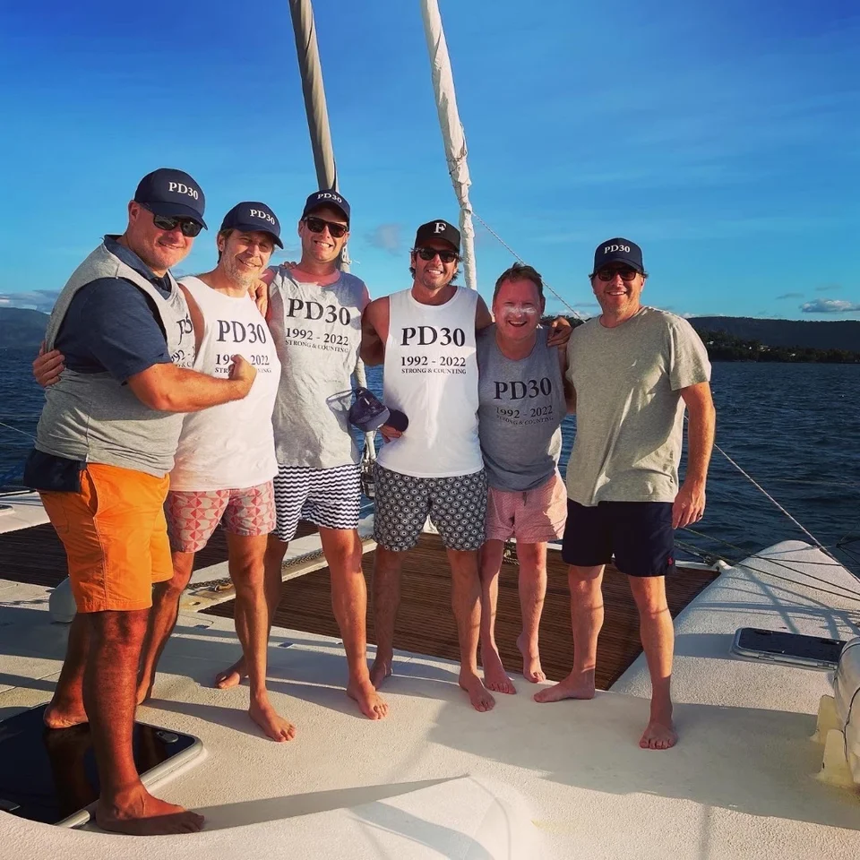A group standing on deck