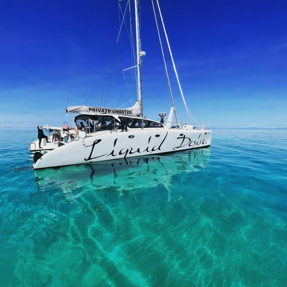 Liquid Desire on clear turquoise water