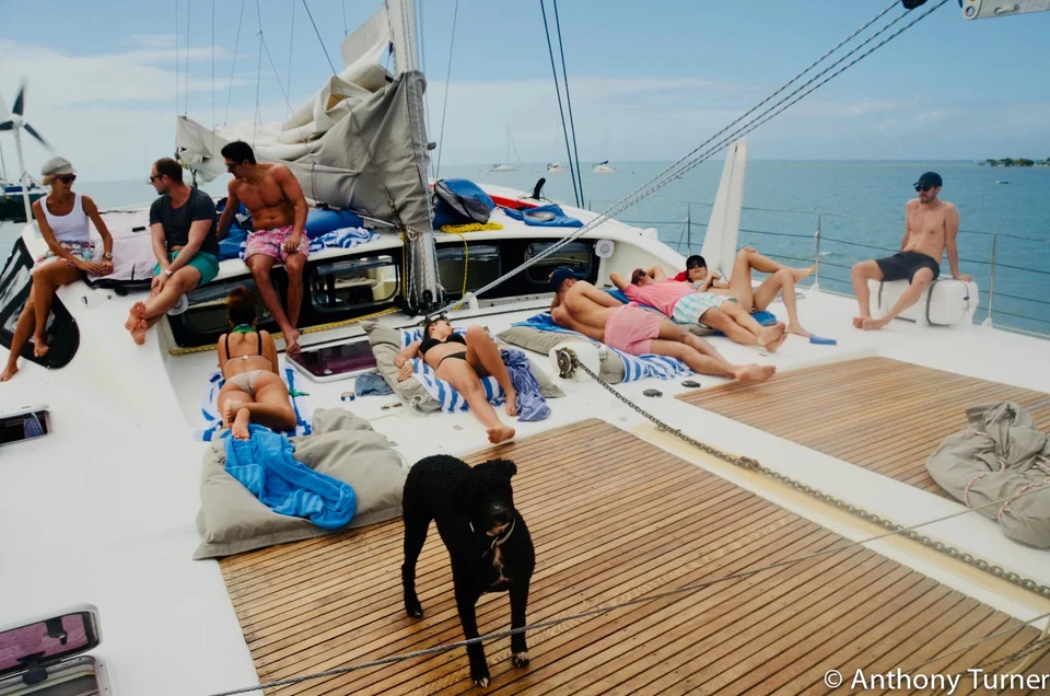 Guests and the dog on the foredeck