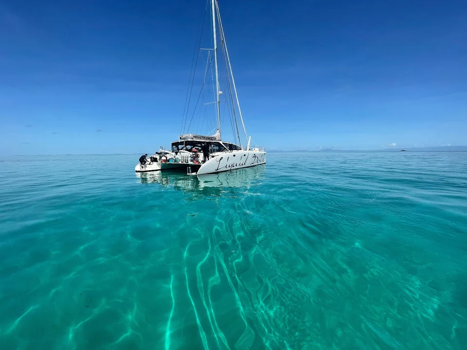 Liquid Desire on a clear, calm sea
