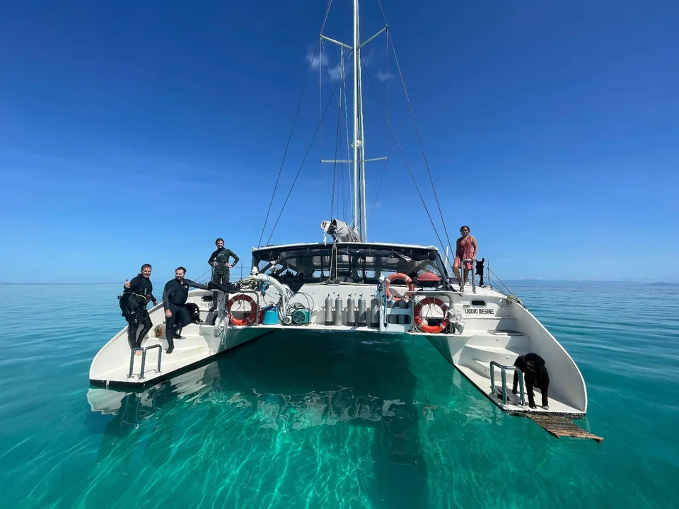 Guests on the bow at anchor